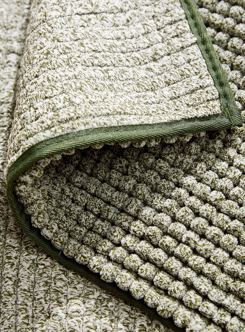 Bleached chenille bath mat
