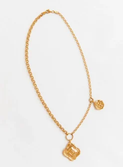 Colliding compass necklace
