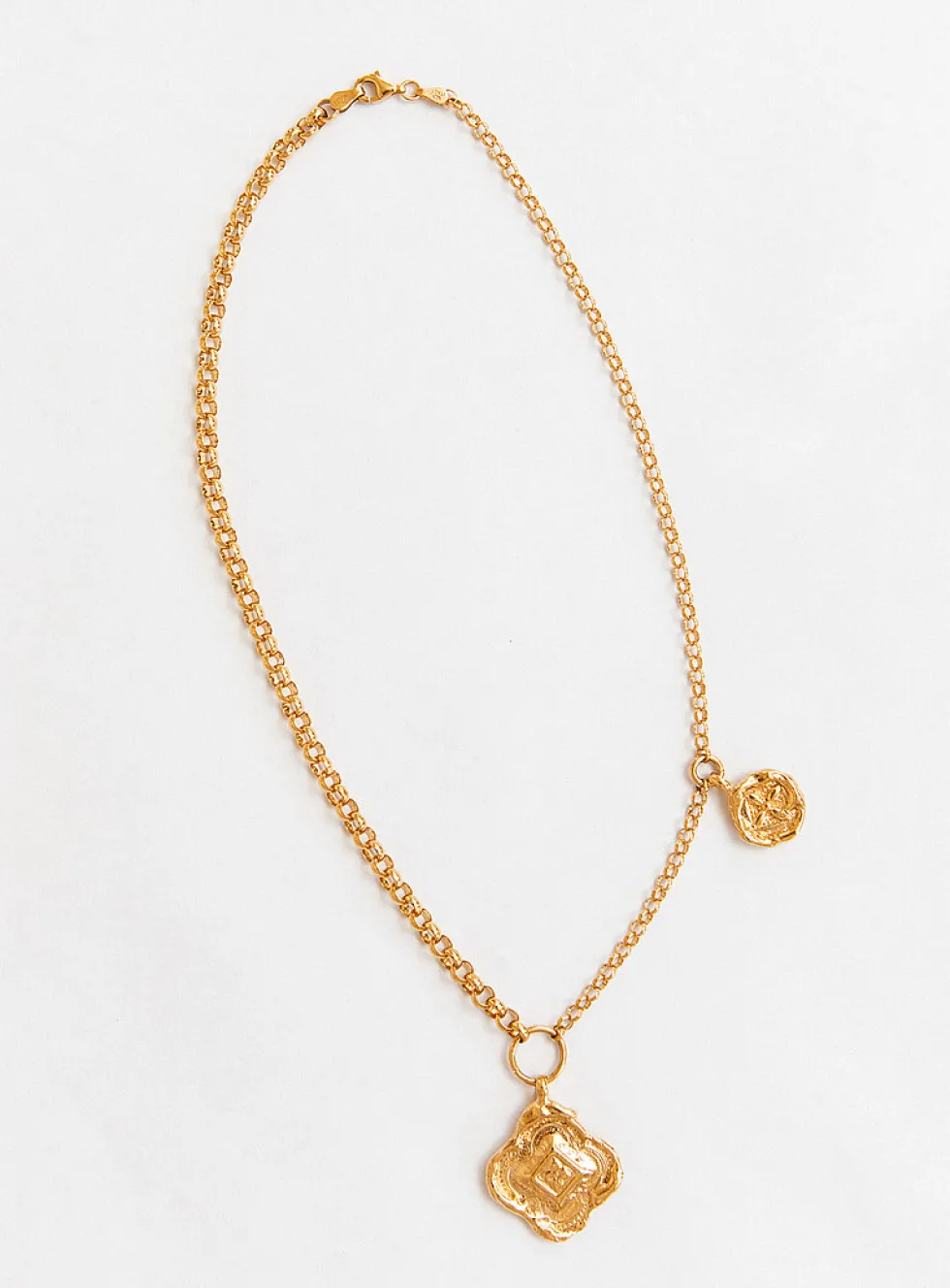 Colliding compass necklace