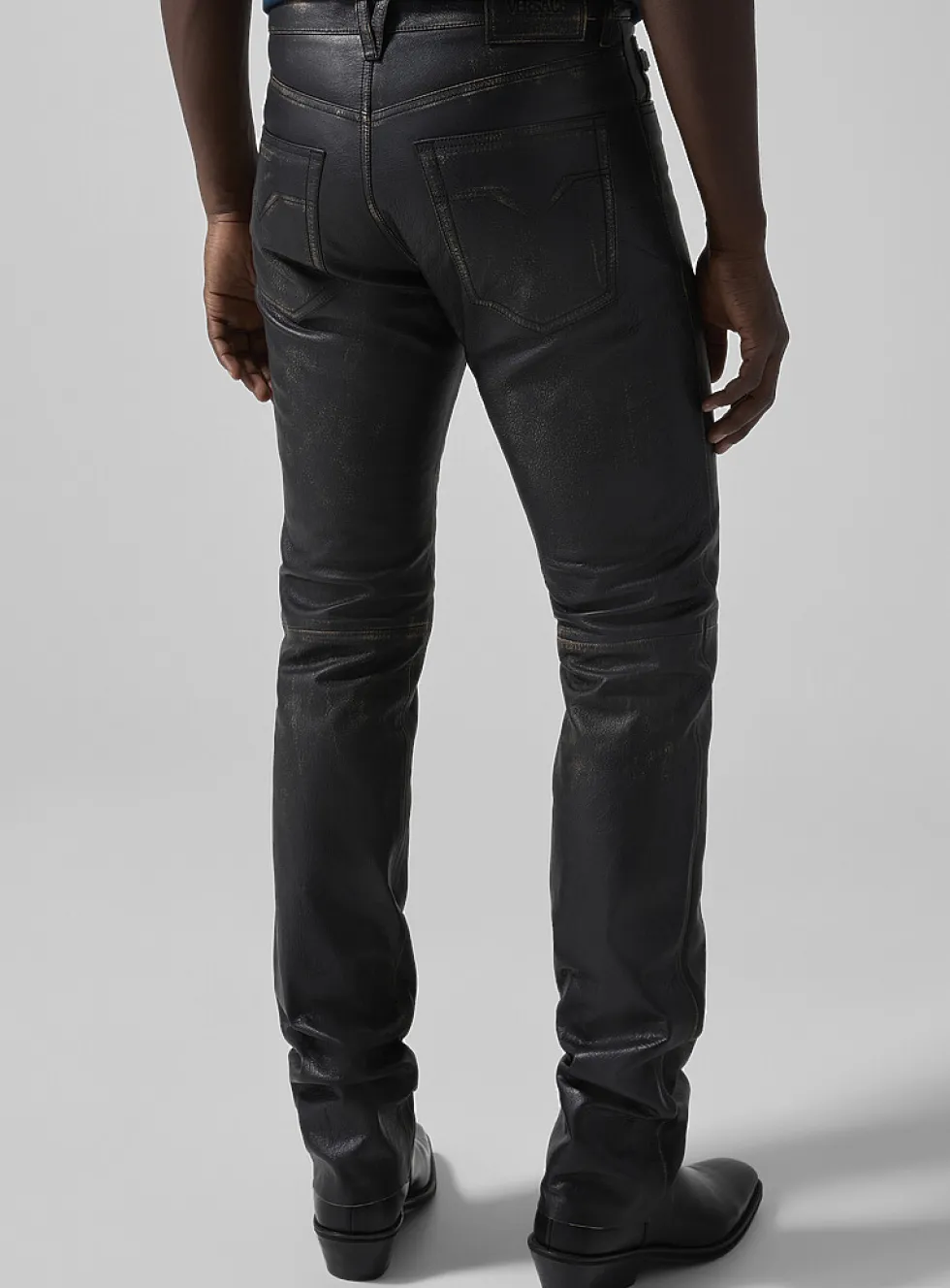 Distressed fitted grained leather pant