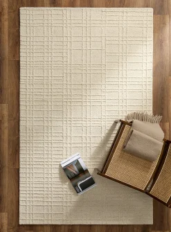 Embossed multi-grid handmade rug