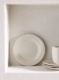 Embossed polka dots small white plate
