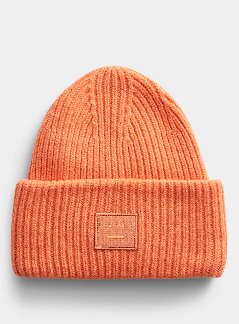 Face logo oversized turned-up cuff toque
