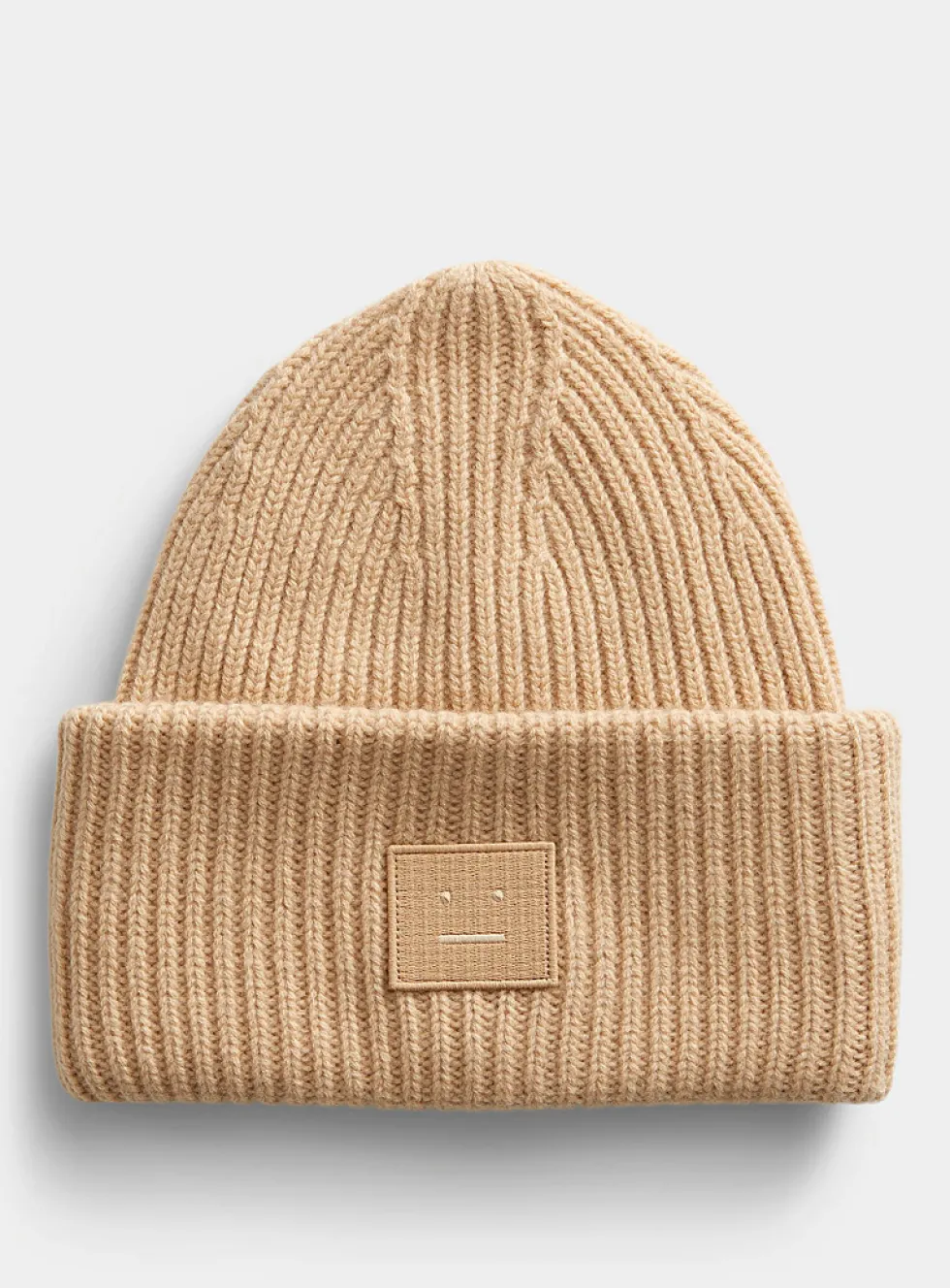 Face logo oversized turned-up cuff toque