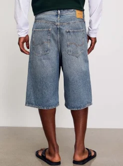 Faded blue denim loose Bermudas