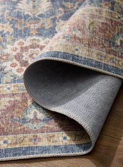 Faded floral fresco rug