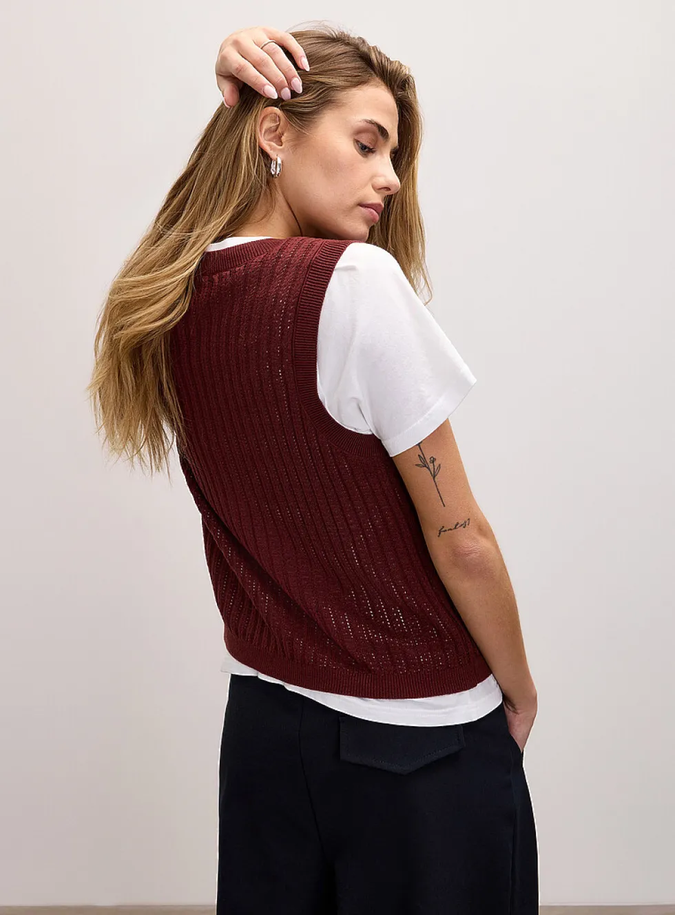 Fine openwork knit vest