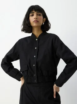 Flap pockets cropped linen-blend jacket