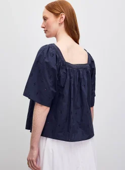 Flared broderie anglaise blouse