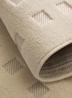 Flat-woven checkers ivory rug