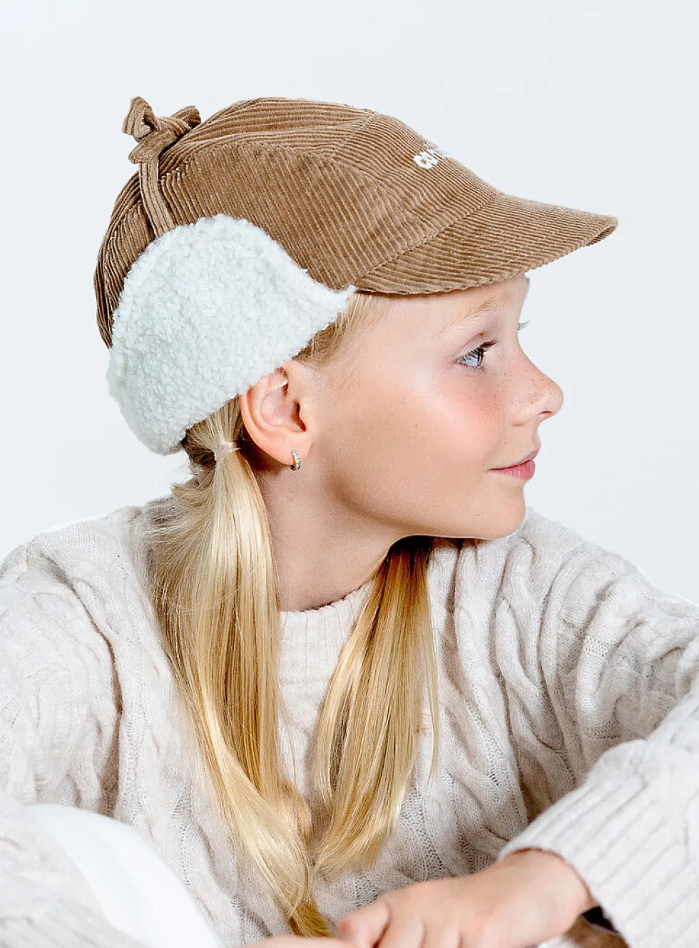 Fleece-lined corduroy trapper cap