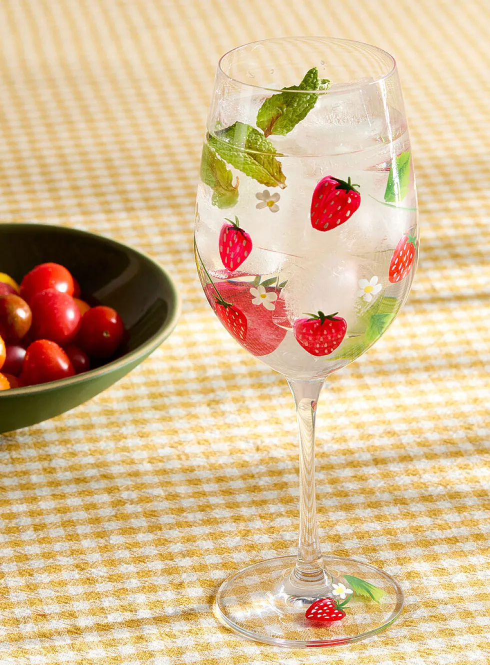 Flowers and strawberries wine glass