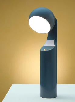 Geometric articulated portable lamp