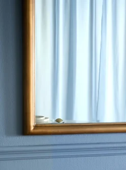 Gold leaf arched mirror