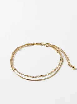 Golden double-chain bracelet