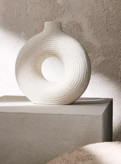 Grooved circular ceramic vase