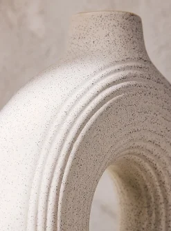 Grooved circular ceramic vase