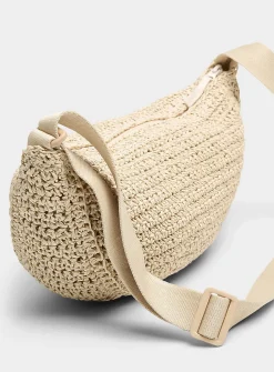 Half-moon braided straw crossbody bag