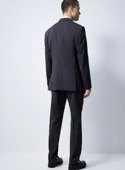 Justin Tenuta dark slate suit