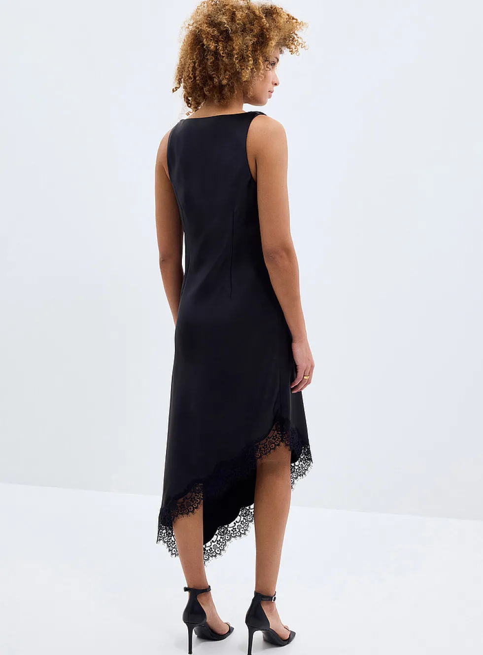 Lace trim satiny asymmetrical skirt