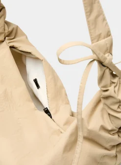 Large half-moon crisp fabric shoulder bag