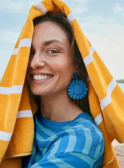 Large raffia flower earrings