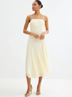 Long vanilla white flowy dress with cape