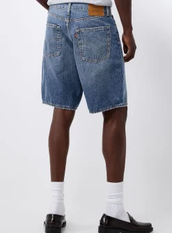 Loose medium-blue jean short