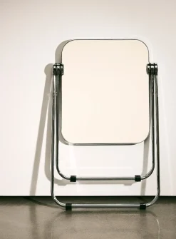 Metal and polyethylene folding accent table