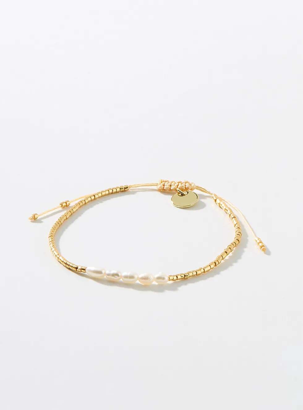 Mini-bead and pearl cord bracelet