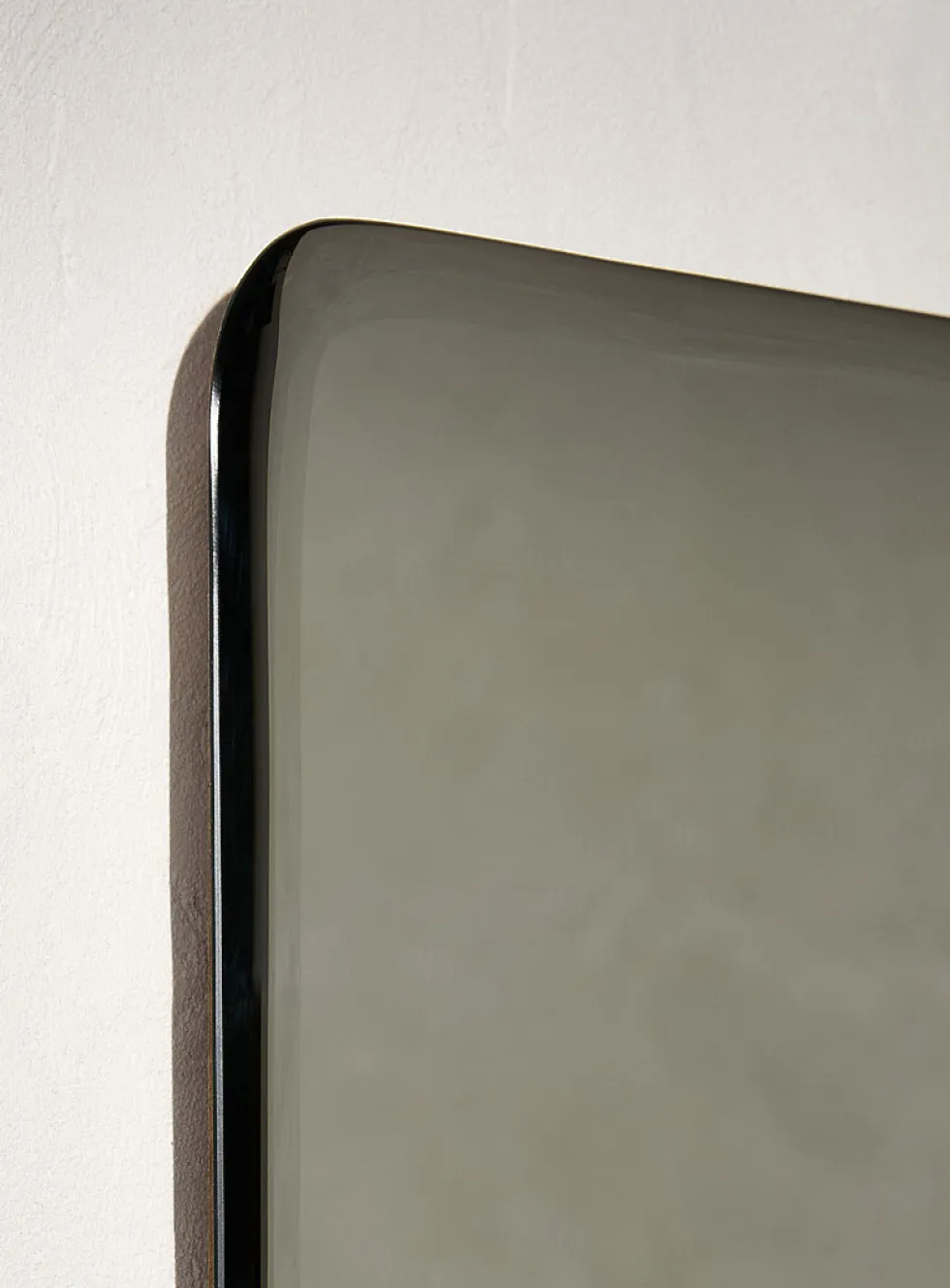 Minimalist frameless mirror