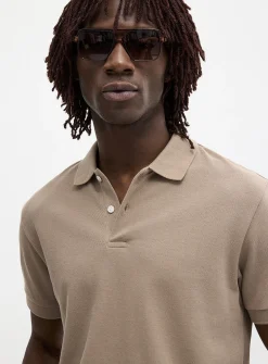 Minimalist piqué polo