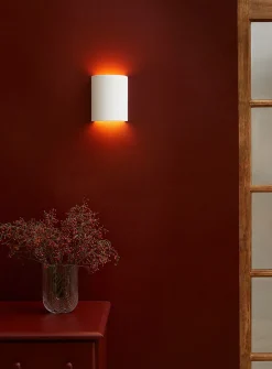 Minimalist white iron wall sconce