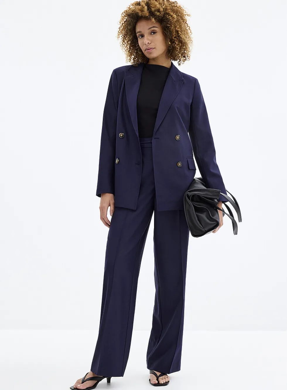 Moderne belted pintuck seam pant