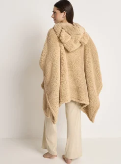 Oversized faux-shearling poncho with ears