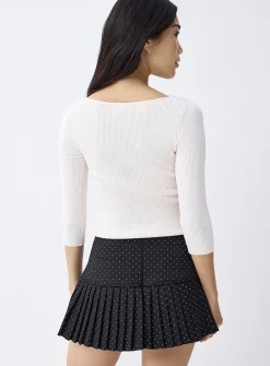 Pin dot pleated miniskirt