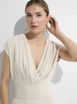 Plunging cross-neck touch of linen blouse