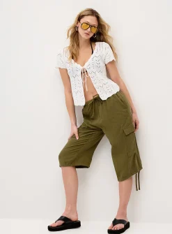 Pointelle knit knotted cardigan
