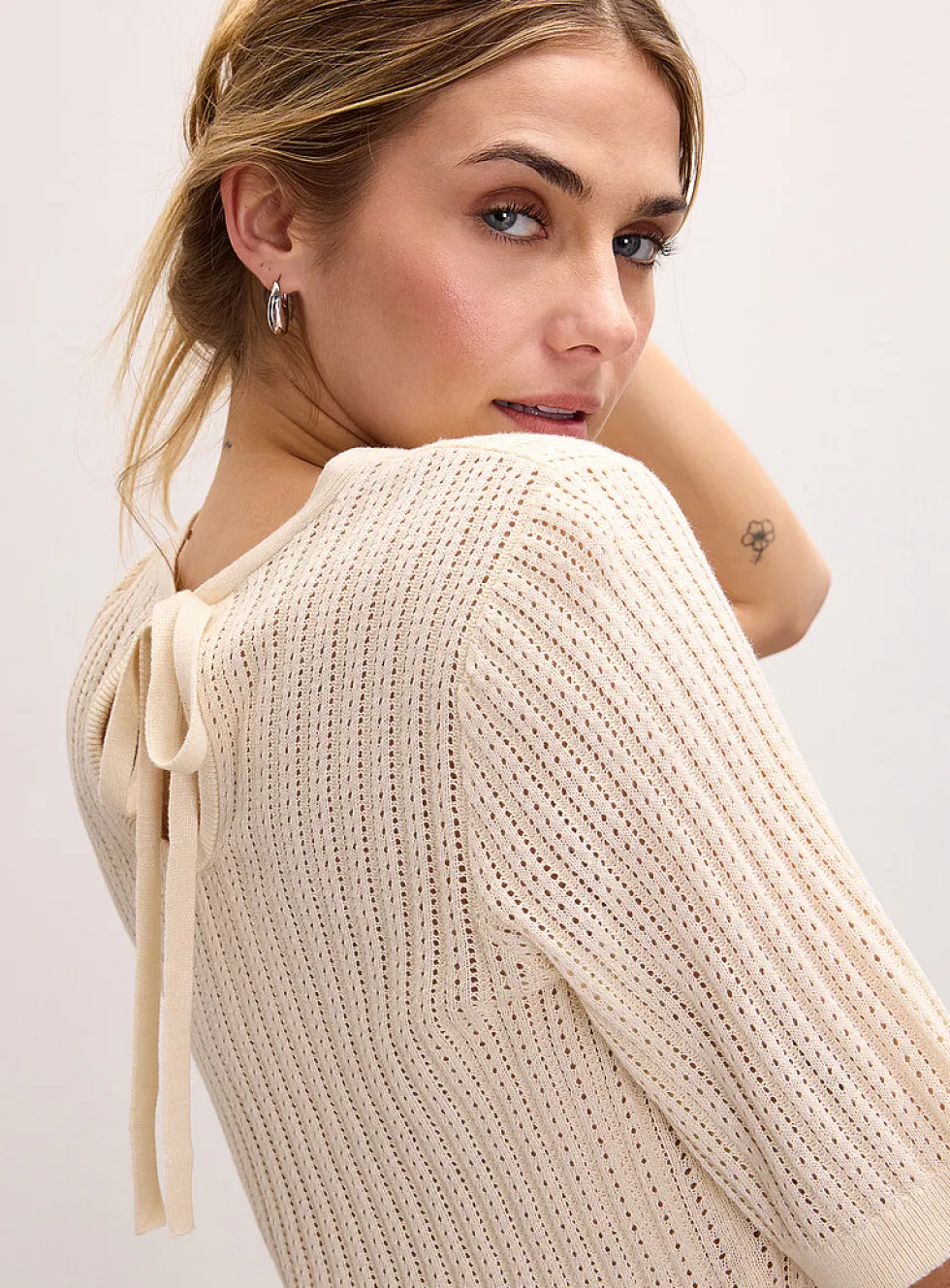 Pointelle-knit short-sleeve sweater