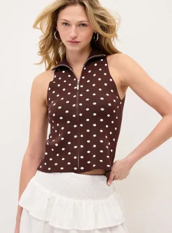 Polka-dotted mock-neck zip-up sweater vest