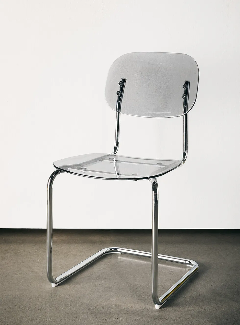 Polycarbonate and metal chairs