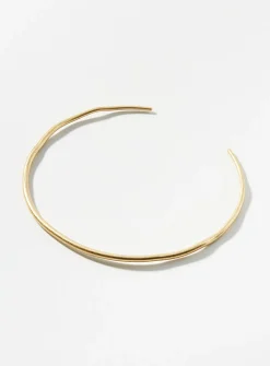 Rigid metallic choker