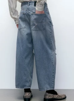 Ripped-knee jean