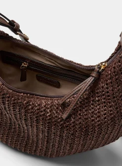 Rounded woven straw hobo bag