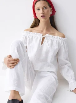 Ruffled off-the-shoulder blouse