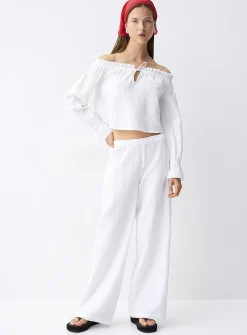 Ruffled off-the-shoulder blouse