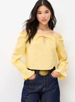 Ruffled off-the-shoulder blouse