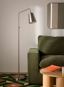 Sleek adjustable-height floor lamp