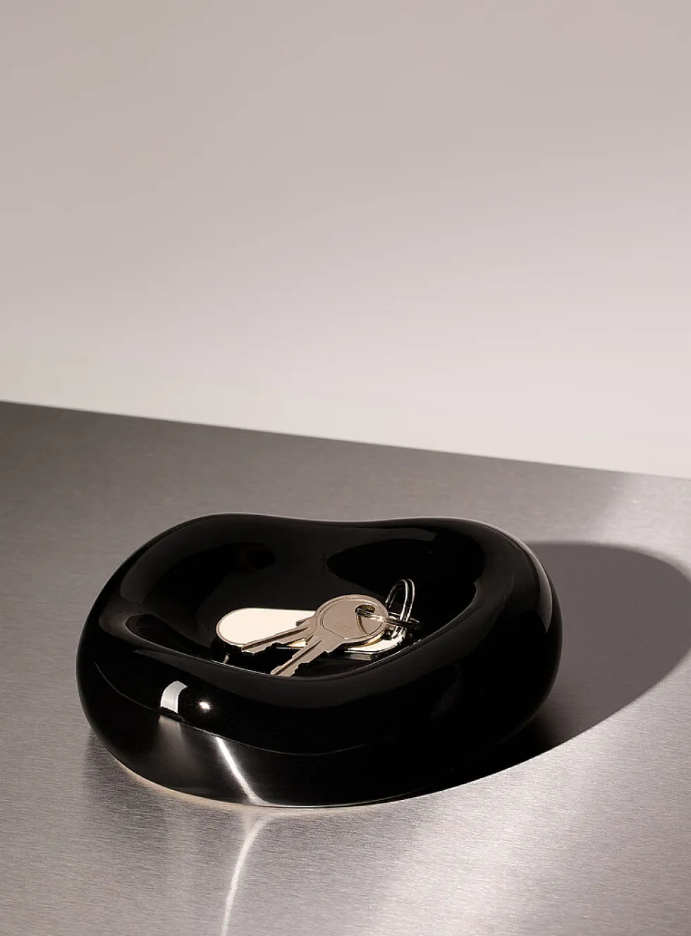 Small black rounded tray
