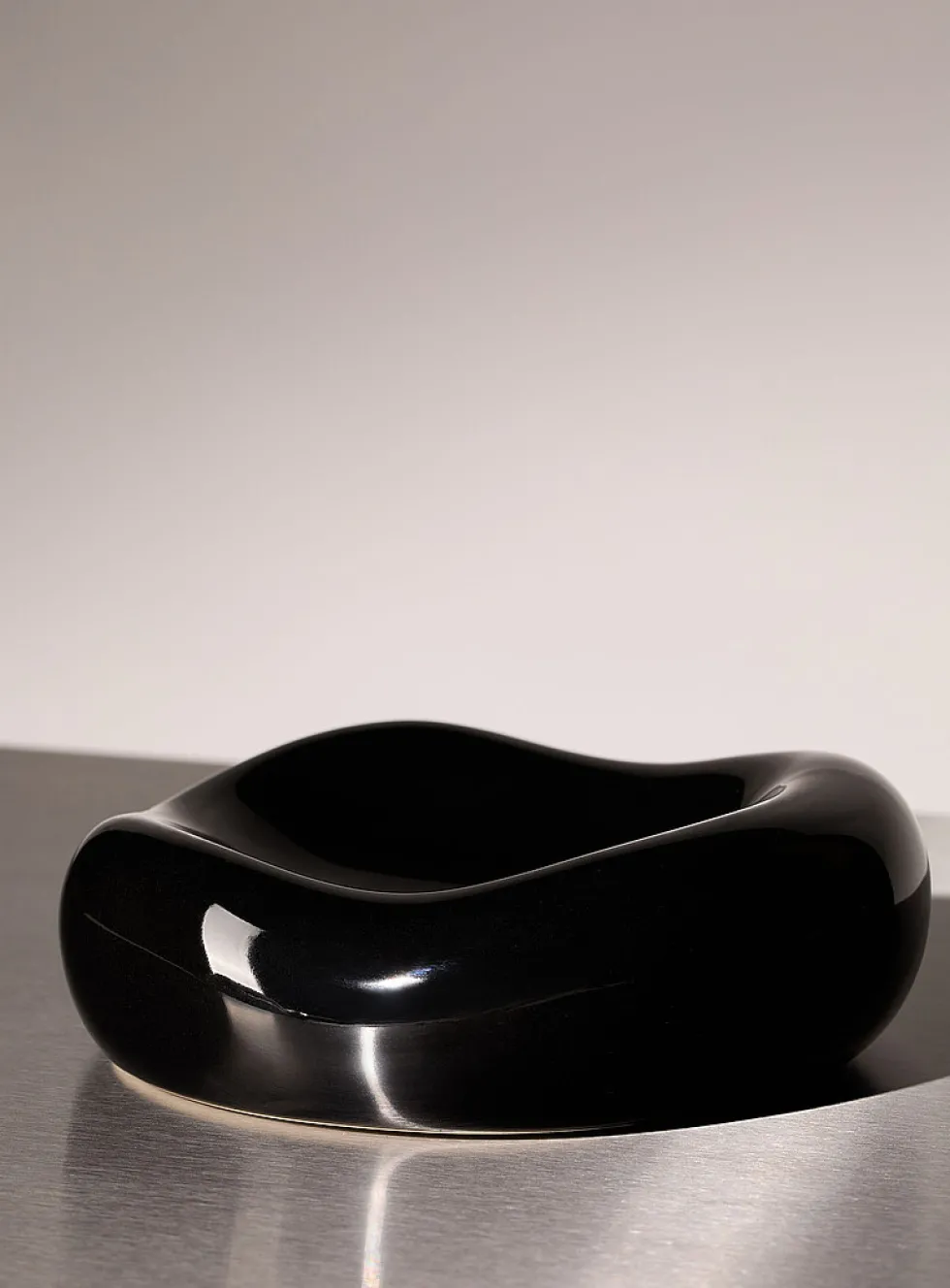 Small black rounded tray